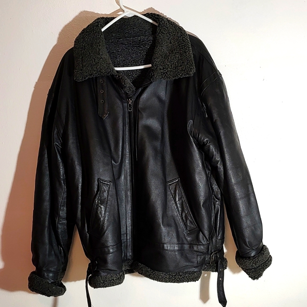 This listing is for a genuine leather bomber jacket, size large.  Exc. Condition